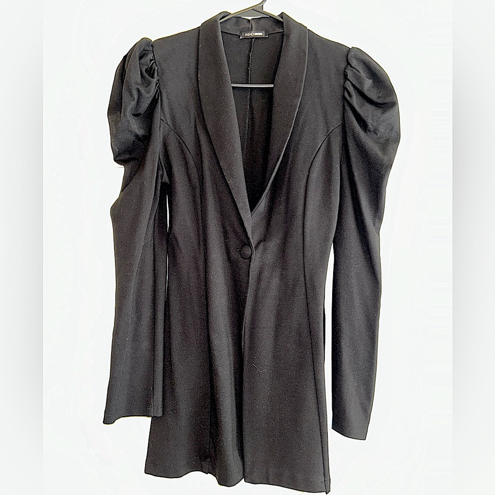 Blazer with ruched shoulder pads.
